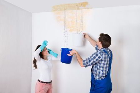 full restoration pros couple with leaky ceiling